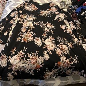 Cute dress with long ruffle sleeves. Worn once.